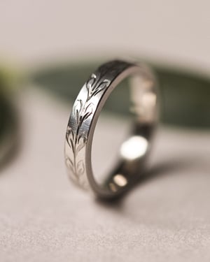 Image of Platinum 4mm ‘Olive leaf’ engraved flat court ring in matte finish
