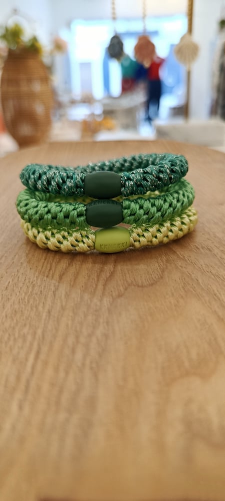 Image of Kknekki trio en verdes