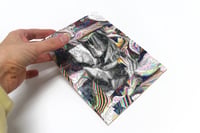 Image 1 of Anne Vieux<br>"/glow_drift" Puzzle
