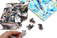 Image 2 of Anne Vieux<br>"/glow_drift" Puzzle