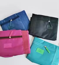 Image 3 of     First Class Fold™ Carry On 