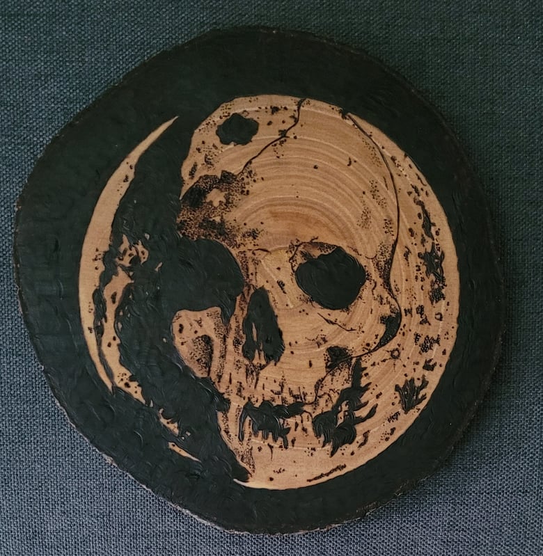 Image of Cosmic Death wood burning piece 