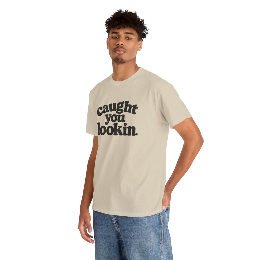 Image of Unisex Caught You Lookin' T-Shirt — Retro Bold Text Graphic Tee