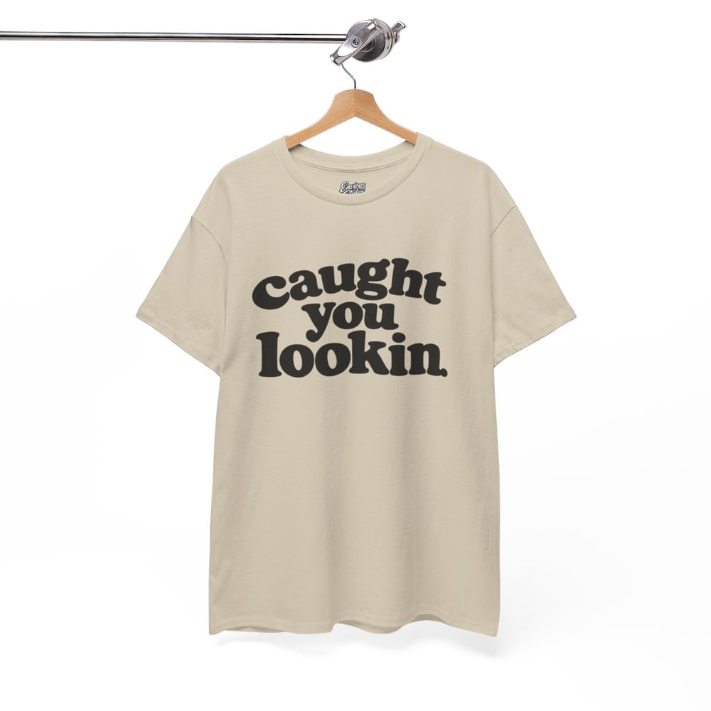 Image of Unisex Caught You Lookin' T-Shirt — Retro Bold Text Graphic Tee