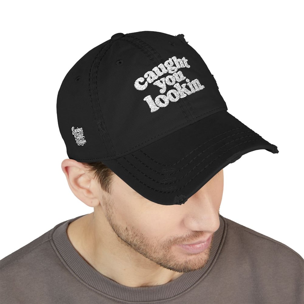 Image of Caught You Lookin' Distressed Dad Hat — Embroidered Vintage Cap