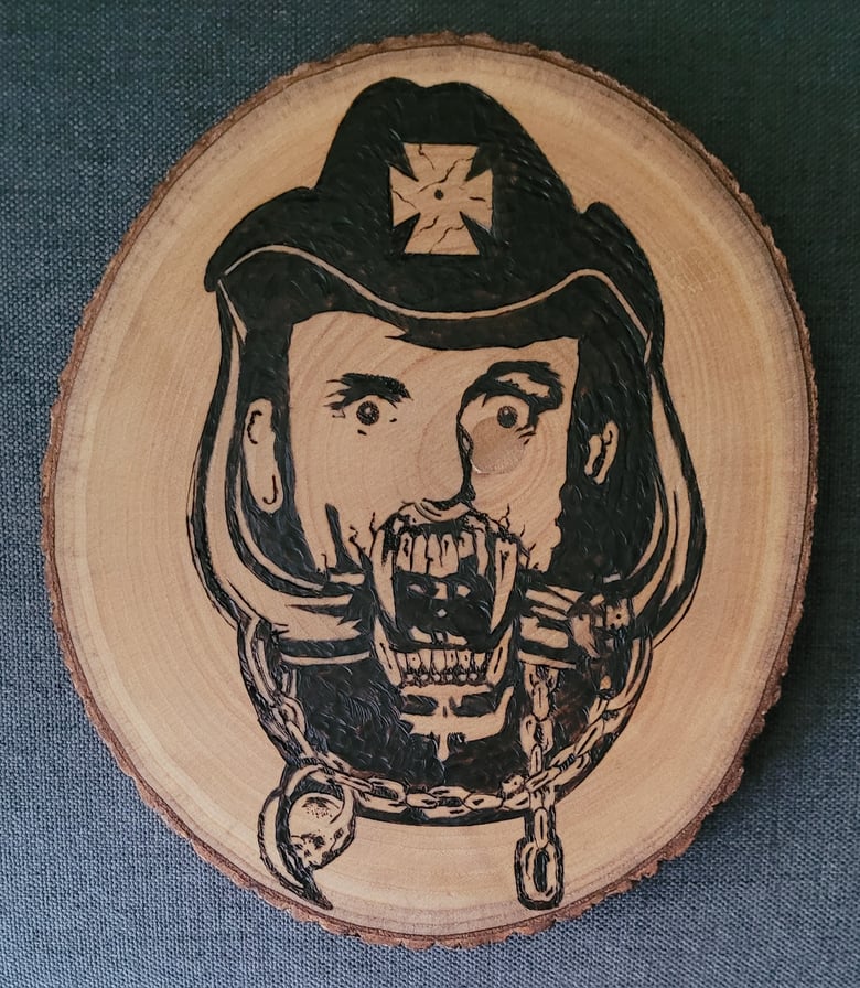 Image of Lemmy wood burning piece. 