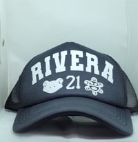 Apellido Black Trucker Cap.