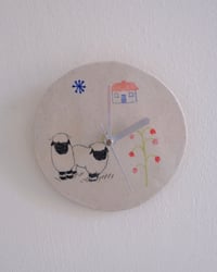 Image 2 of Baby sheep, little cottage, and bellflower wall clock