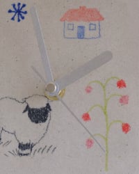 Image 1 of Baby sheep, little cottage, and bellflower wall clock
