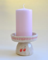 Image 3 of Bell flower, kitten, and cherry pillar candle holder