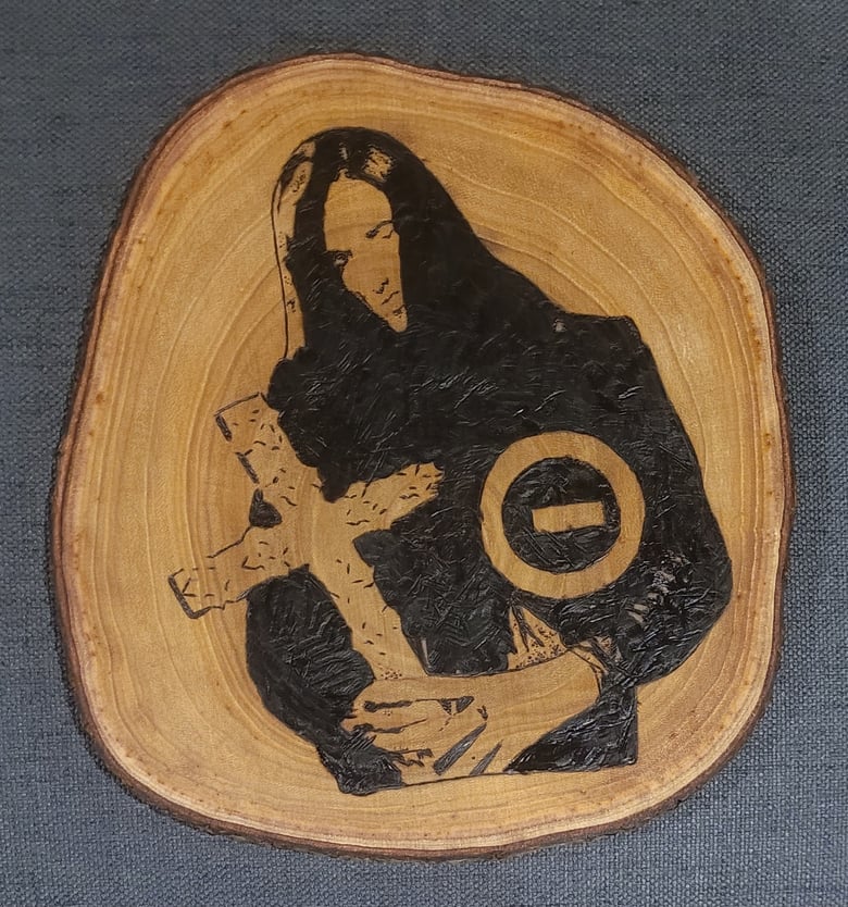 Image of Black No.1 wood burning piece 