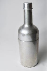 Image 1 of Vintage 1920s F. E. Fonseca + Co Aluminum Bottle