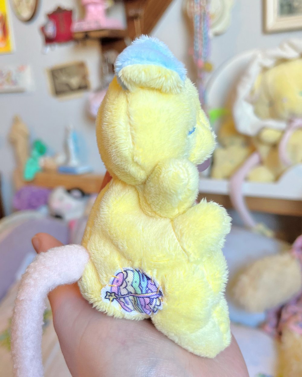 Image of Hugg-A-Me Babey! Yellow with purple ball