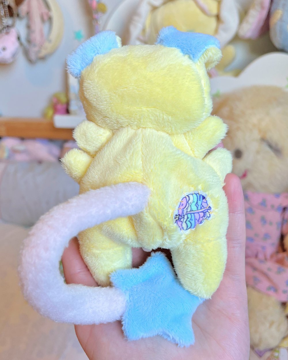 Image of Hugg-A-Me Babey! Yellow with purple ball