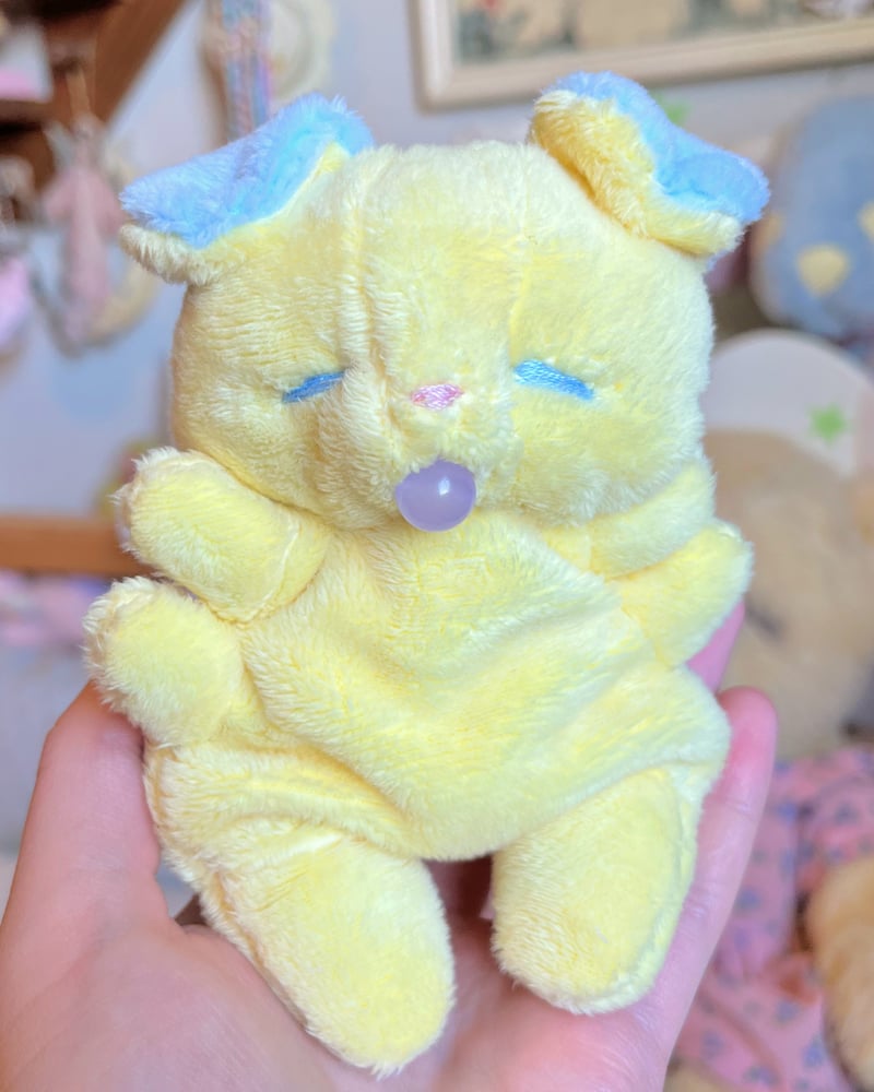 Image of Hugg-A-Me Babey! Yellow with purple ball