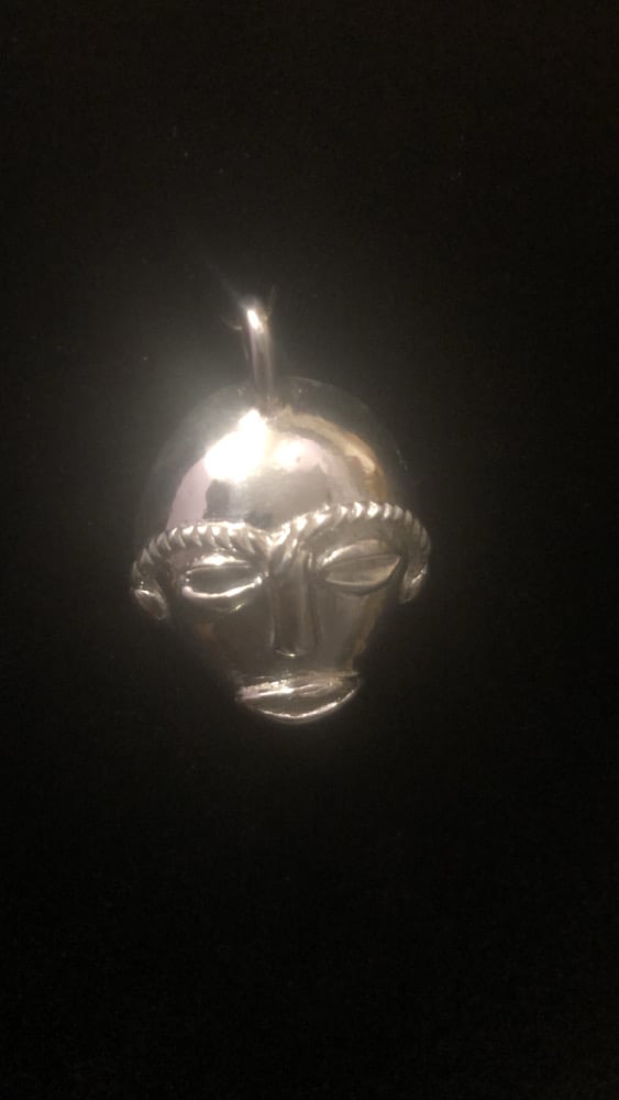 Image of silver African mask pendant 