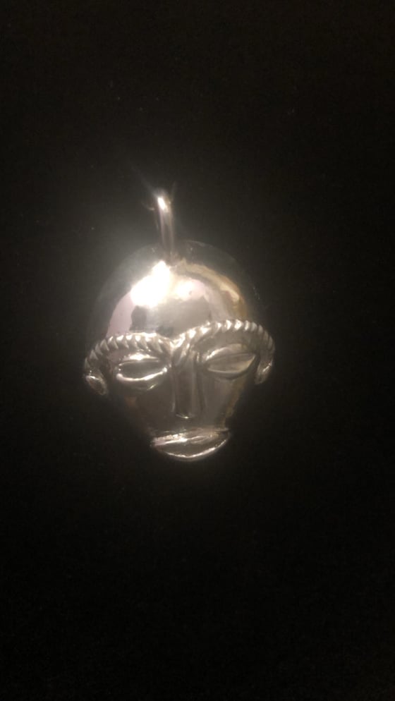 Image of silver African mask pendant 