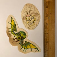 Image 1 of 1970’s Hand colored pork chop skulls 