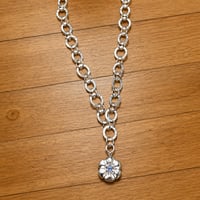 Silver flower with amethyst 