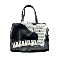 Image 1 of Axes Femme piano sheet music bag