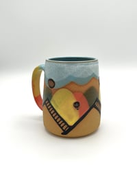 Image 2 of Hot Air Balloon Mug on brown clay