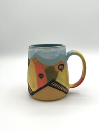 Image 1 of Hot Air Balloon Mug on brown clay