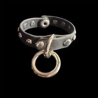 Image 1 of Black faux leather round spot bondage snap cuff