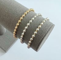 Image 1 of Mixed metal stacking stretch bracelet