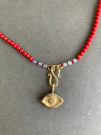 Image 3 of Brass Averting Eye on a coral strand 