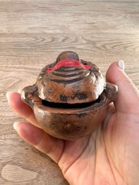 Image 6 of Dorei Clay Bell - A blue-eyed man