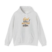 Image 1 of God Is Still Writing My Story Hoodie — Inspirational Christian Faith Sweatshirt