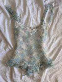 Image 7 of Vintage Y2K blue and white floral silk cami with asymmetrical hem and frilly straps 
