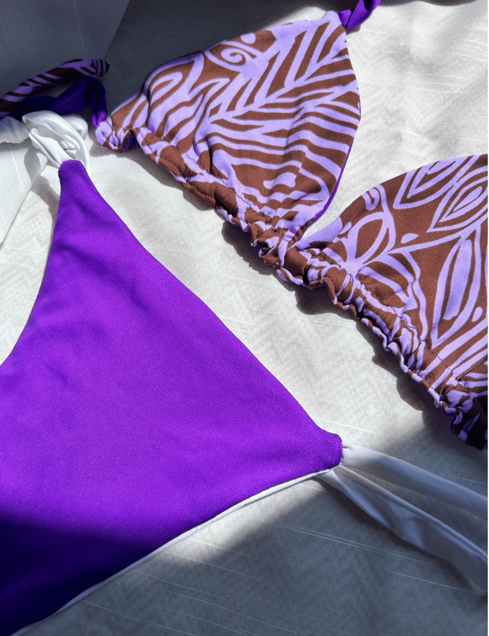Image of the amethyst purple reversible bikini set