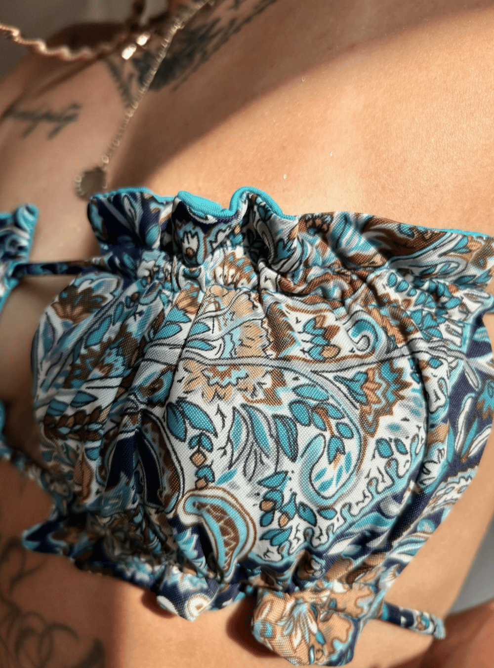 Image of the majolica blue arabesc reversible bikini top
