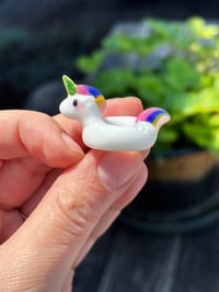 Image 2 of White unicorn pool float 