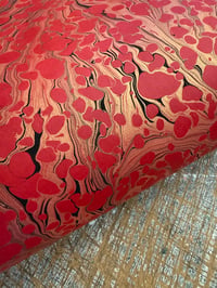 Image 1 of Hand Marbled paper - black and gold vein on bright red 