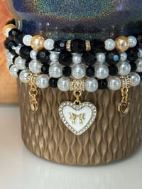 Image 1 of Wild Blooms Black, Cream, and Gold Tumbler Bracelet Stack