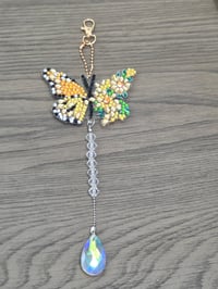 Yellow butterfly suncatcher 