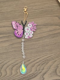 White flower butterfly suncatcher 