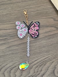 Pink butterfly suncatcher 