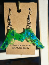 Green glow guns 