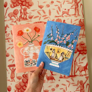 Image of Pair of A5 stapled paper notebooks - blue and pink