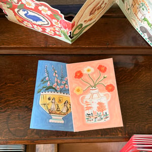 Image of Pair of A5 stapled paper notebooks - blue and pink