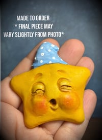 Image 1 of Made to Order Sleeping Star Magnet  , blue or pink cap 