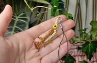 Image 1 of Spotted gar charms