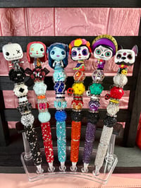 Image 1 of Day of the death and Tim Burton characters  beaded pen 🖊️ 🎃🖤