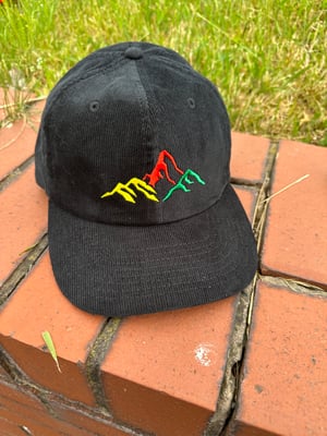 Image of ‘Mountains of 58’ Heritage Cord  Cap in Camel Black & Dark Olive 