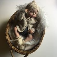 Image 3 of crochet cotton jersey bonnet.