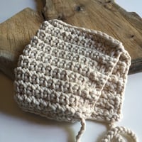 Image 2 of crochet cotton jersey bonnet.