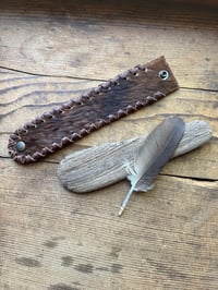 Image 1 of Handcrafted Cowhide Cuff Bracelet | Hand-Laced Leather | Snap Closure 